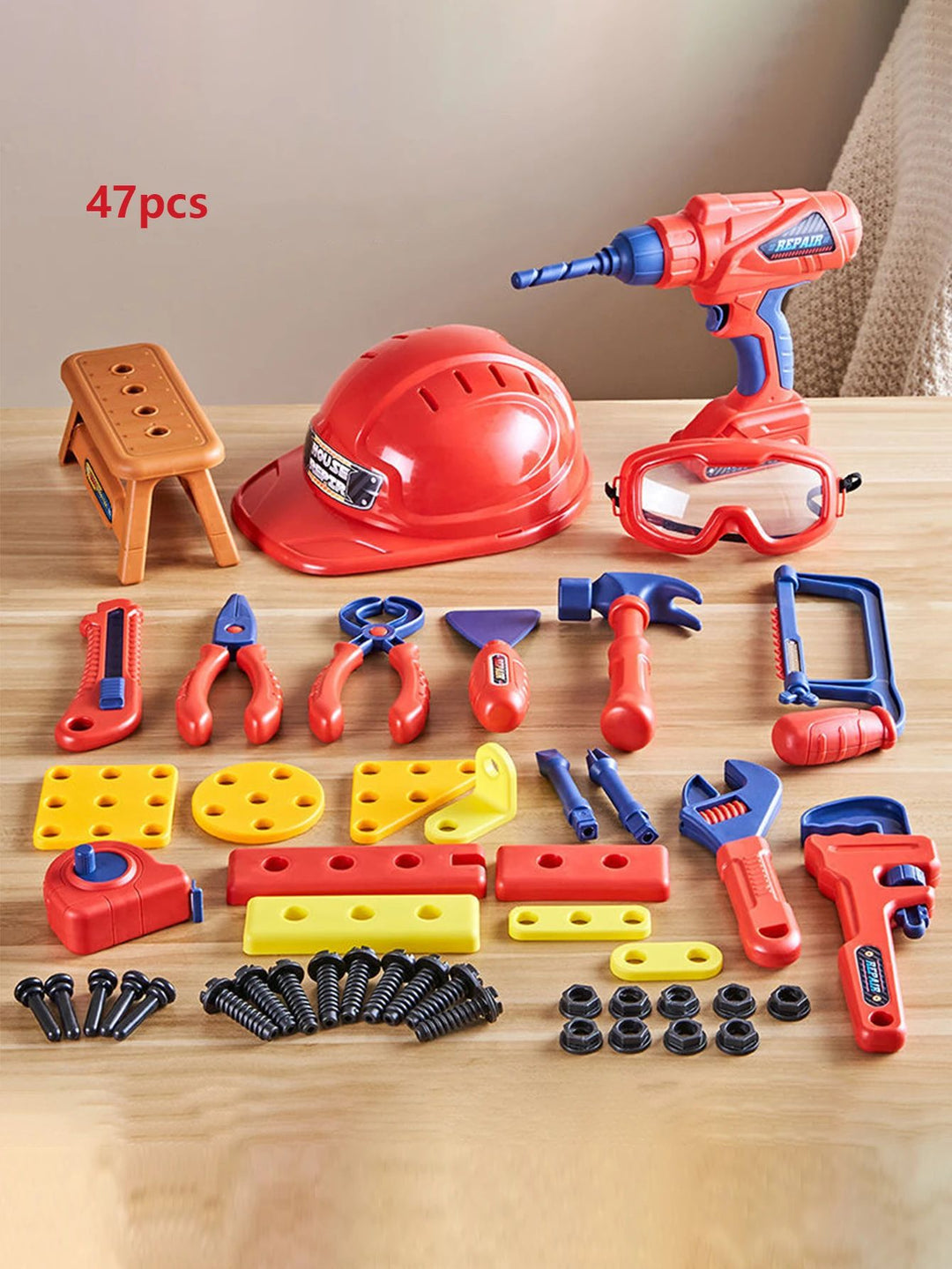 47-piece toy tool set with a drill, play helmet, goggles, hand tools, and building pieces