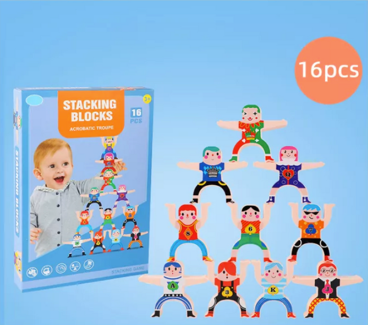 Colorful acrobat figures stacked in a pyramid beside the game box