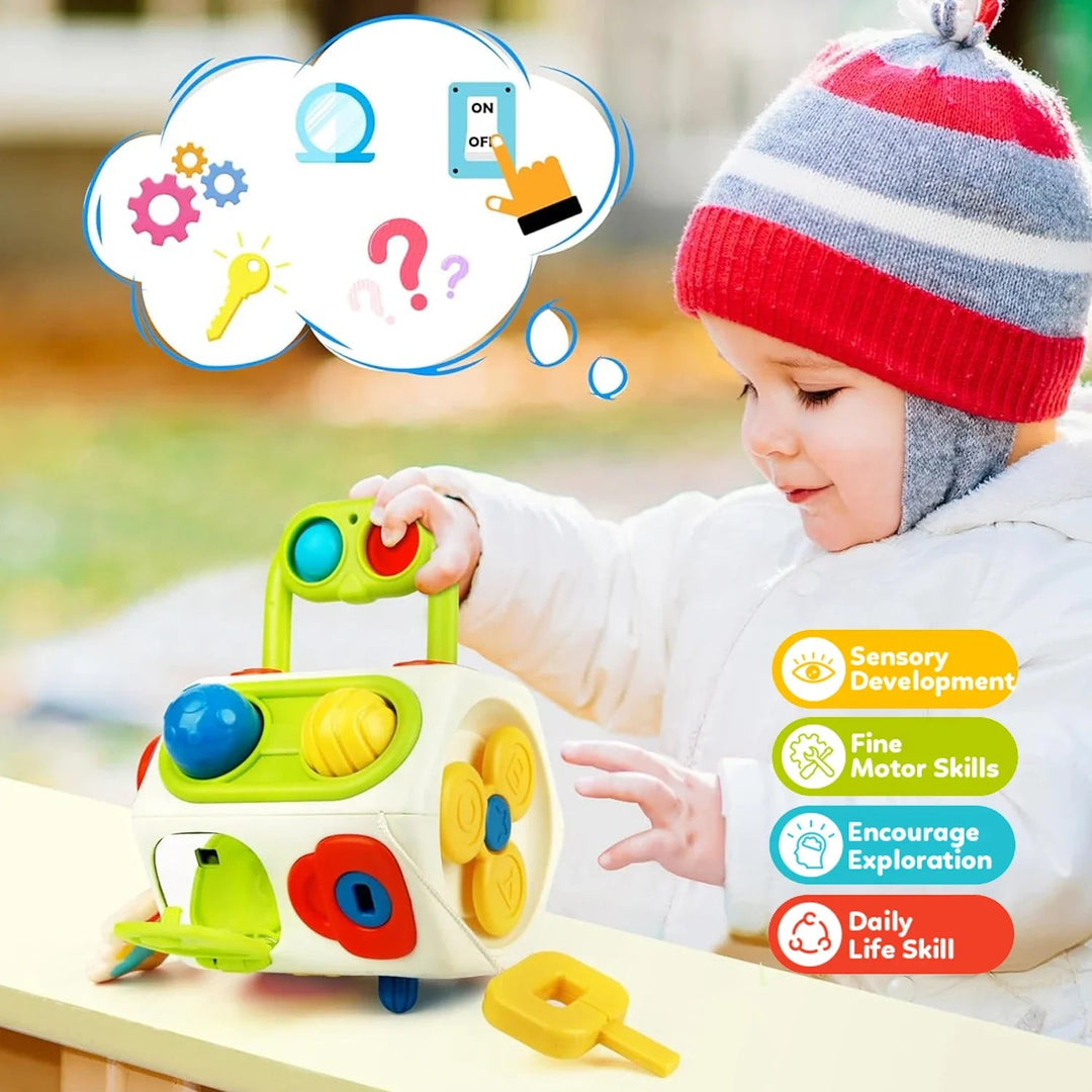 Child exploring the activity cube outdoors, with sensory and fine motor activity callouts