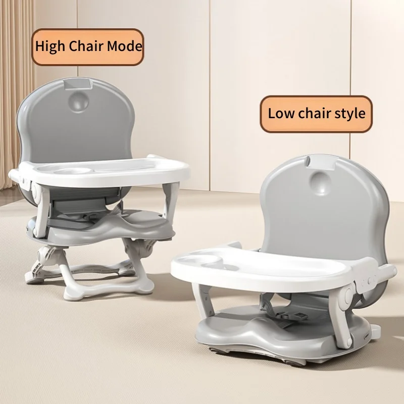 Gray feeding chair shown in raised and low seating positions