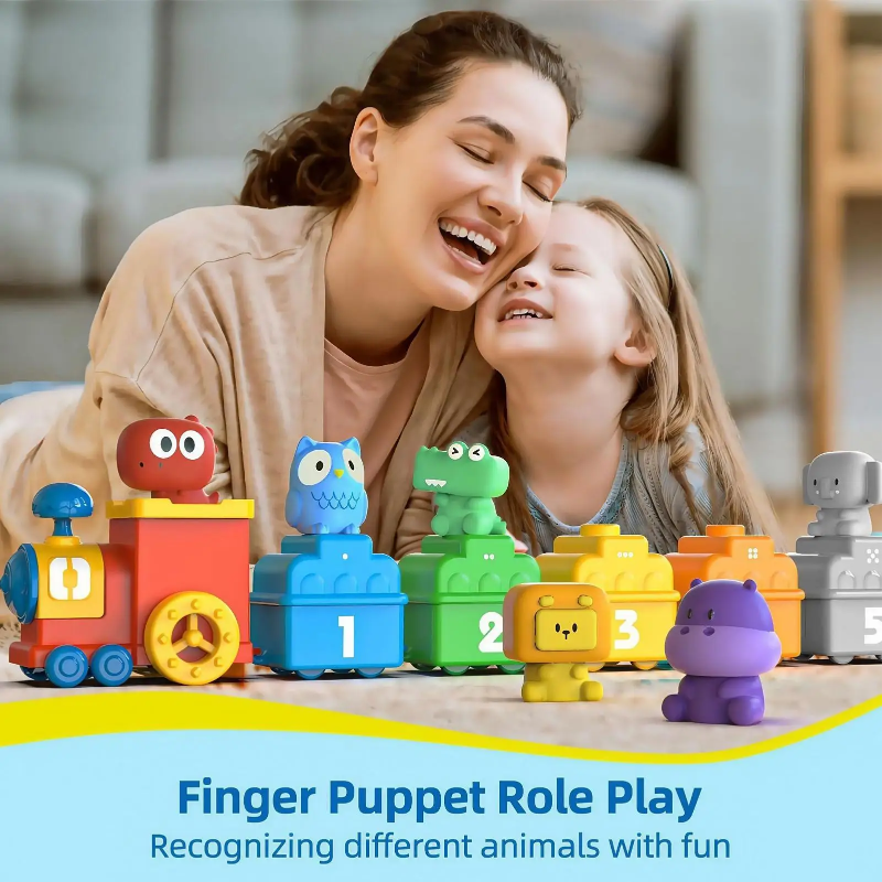 Smiling adult and child behind a colorful animal train with removable figures
