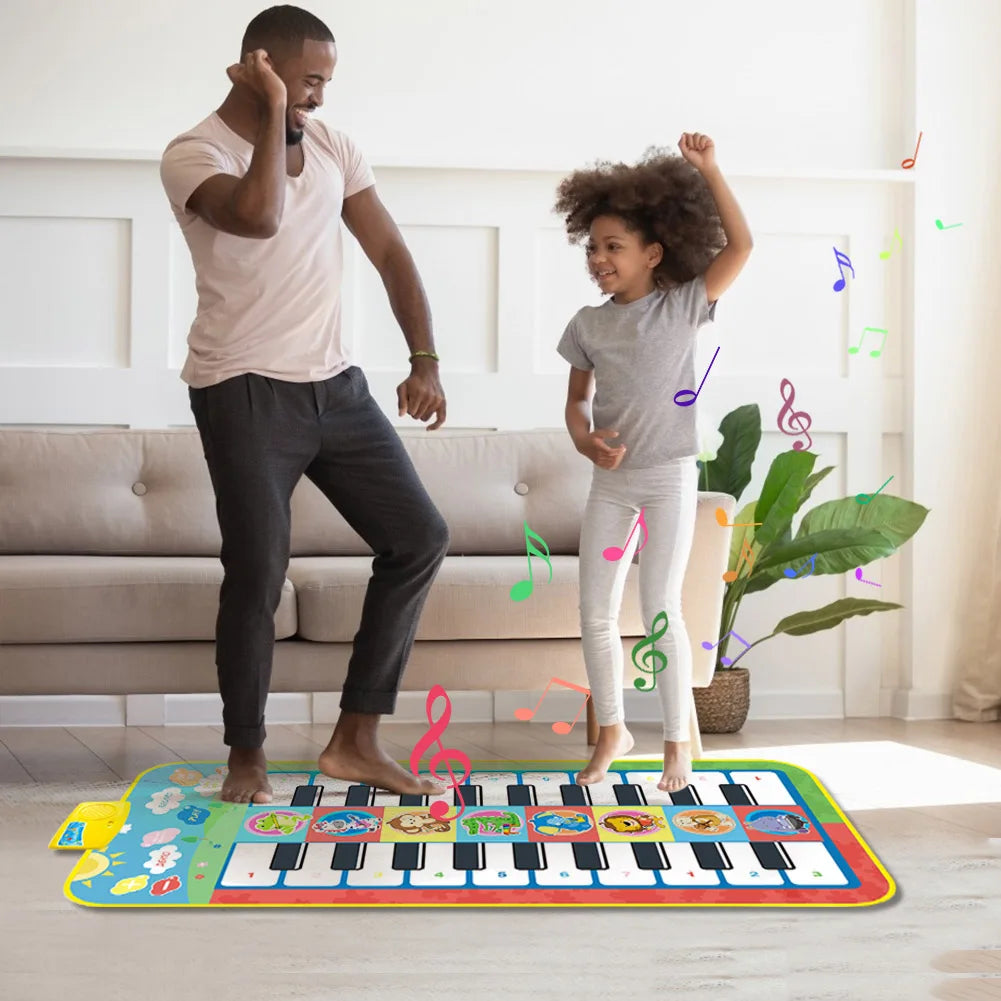 Adult and child moving together on a piano play mat in a living room