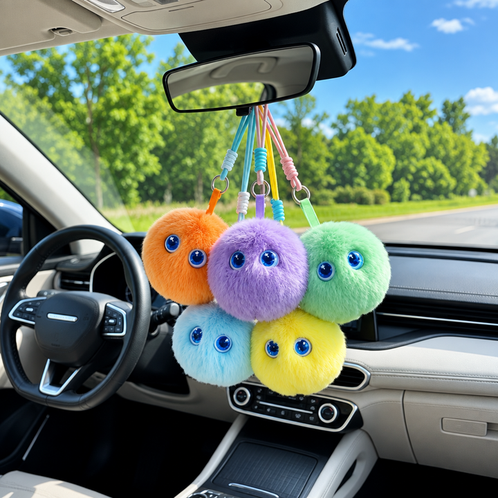 Five colorful AI plush toys hanging below a car&