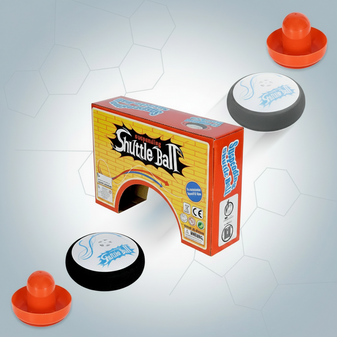 Air hockey pucks and orange paddles displayed around an arched cardboard package