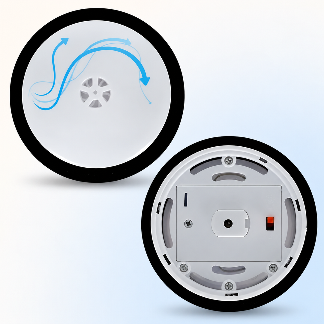 Top and underside views of the air hockey puck, showing the battery cover and power switch
