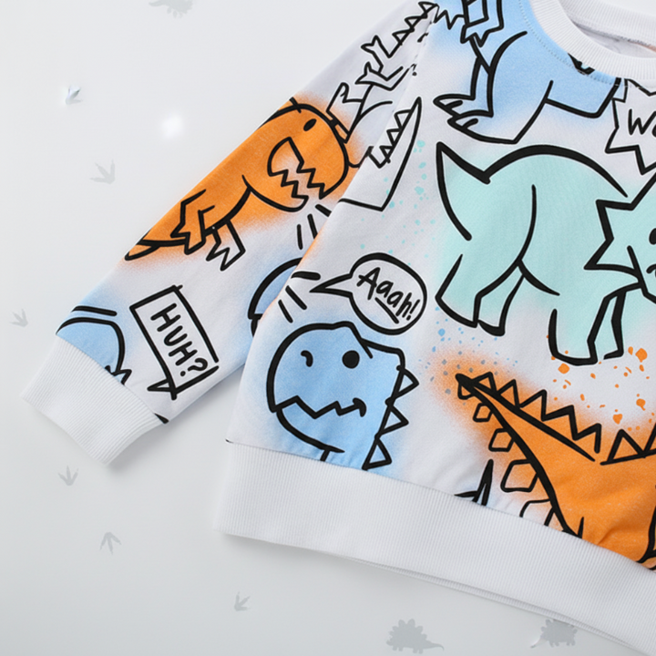 Sleeve and hem details on a white sweatshirt with colorful outline dinosaur prints