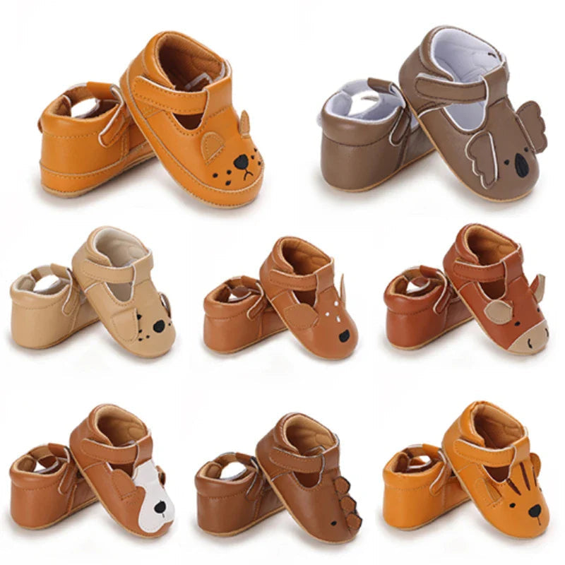 Animal baby shoes in assorted designs with strap closures and decorative ears