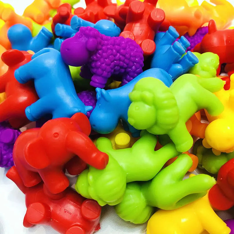 Close-up of colorful animal counters, including an elephant, sheep, and lion