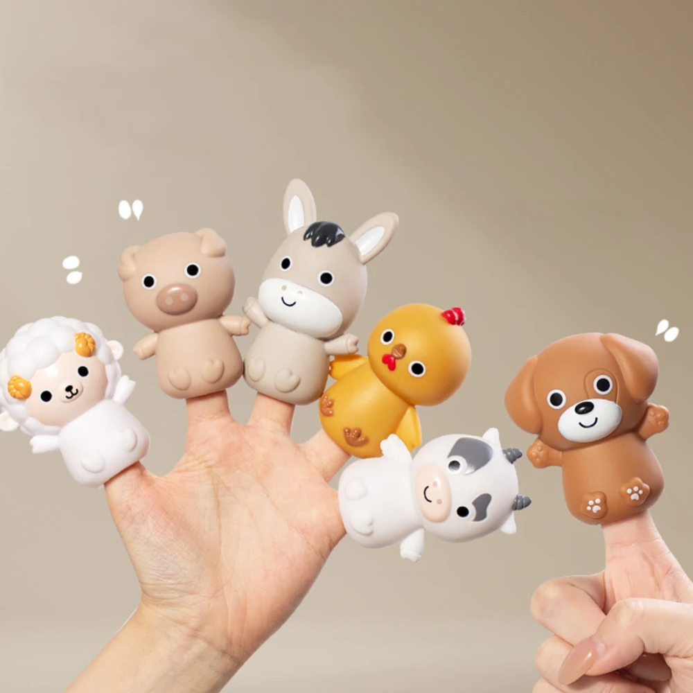 Six animal figures worn as finger puppets for pretend play