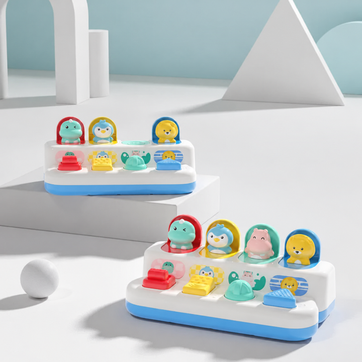 Two white-and-blue animal pop-up toys with colorful controls