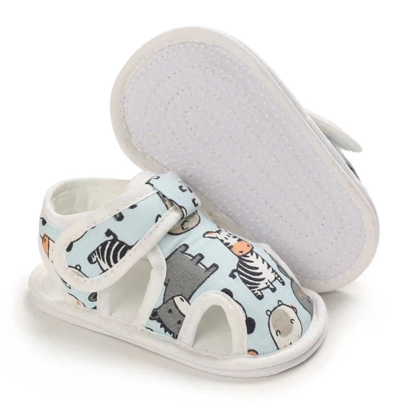Light blue animal-print sandal beside an upturned sandal showing the white textured sole