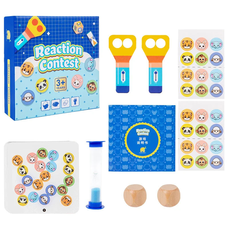 Game components arranged beside the box, including cards, two paddles, dice stickers, dice, and an hourglass