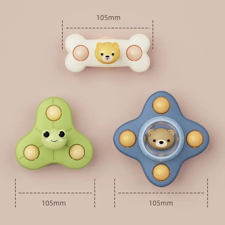 White, green, and blue animal spinners with 105 mm width measurements