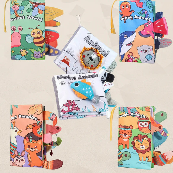 Animal, ocean, and insect cloth books with colorful covers and textured fabric tails