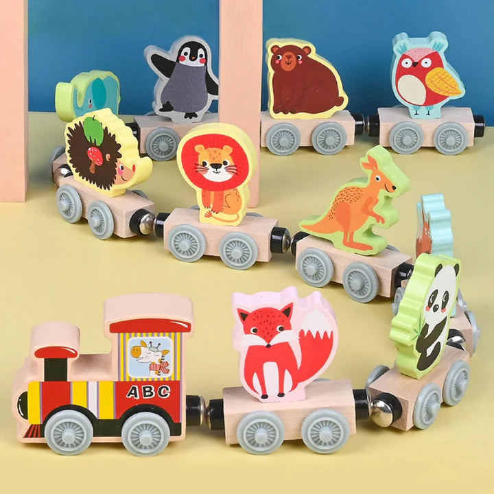 Wooden train engine and colorful animal cars arranged on a yellow surface