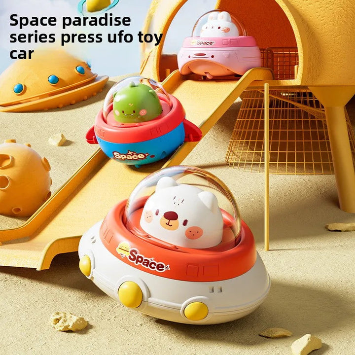 Animal-pilot UFO toys arranged on and beside a yellow ramp.