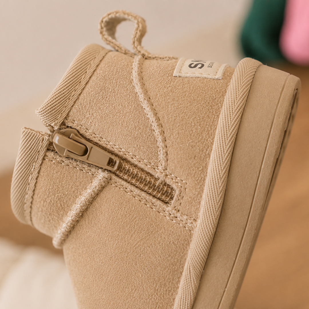 Close-up of a beige ankle boot&