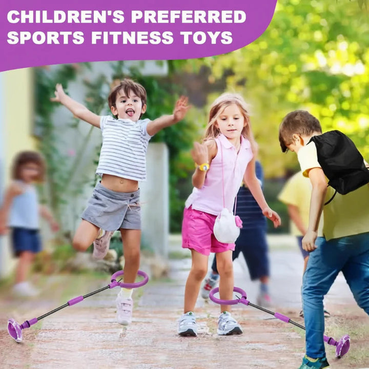Children jumping with purple ankle skip balls on a paved outdoor path