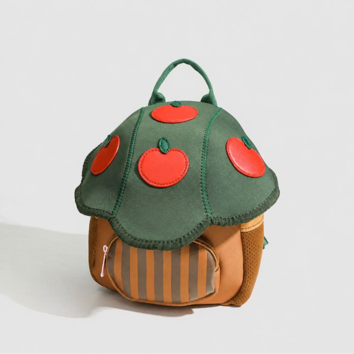 Front angled view of the Apple Tree backpack with red apple details and a striped zipper pocket.