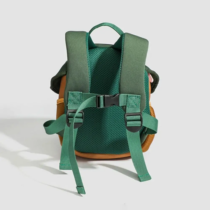 Back of the Apple Tree backpack showing green shoulder straps, mesh back panel, and chest buckle.