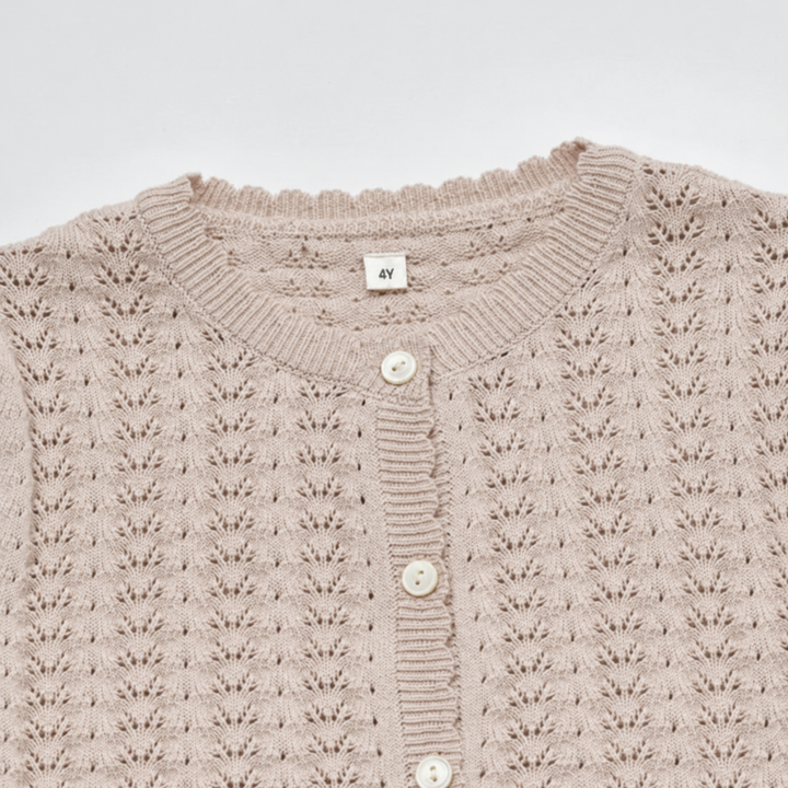 Close-up of the apricot cardigan&