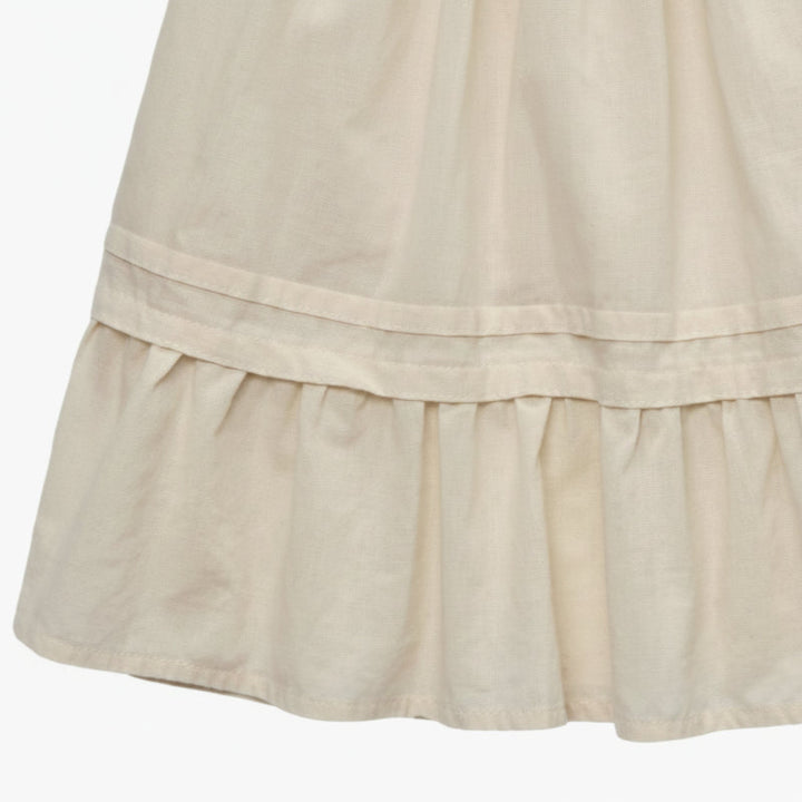 Close-up of the apricot dress&