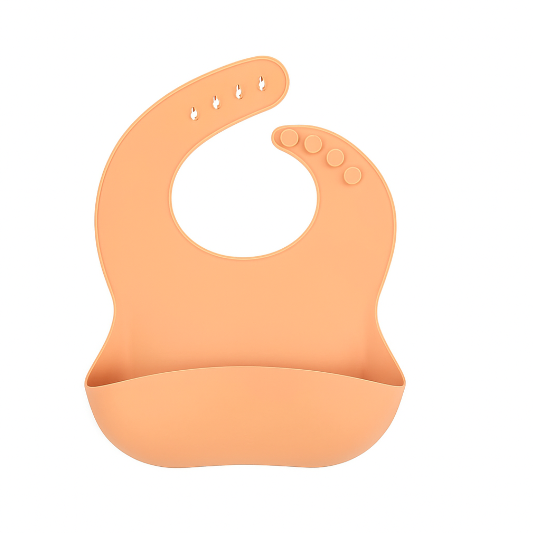Apricot silicone bib with a wide front pocket and adjustable snap neck.