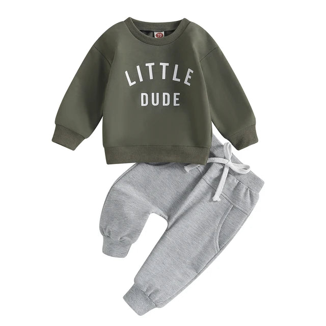 Army green Little Dude sweatshirt and gray cuffed pants
