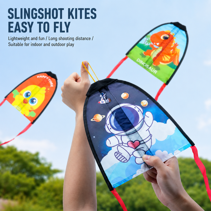 Hands holding an astronaut kite and elastic loop with dinosaur and duck kites in the background