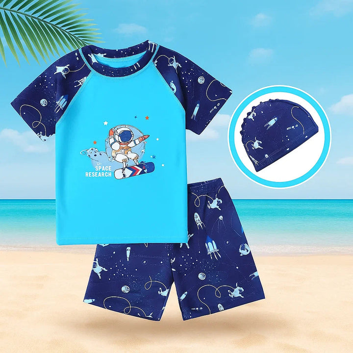 Astronaut swim shirt and shorts with a space-print swim cap shown in an inset