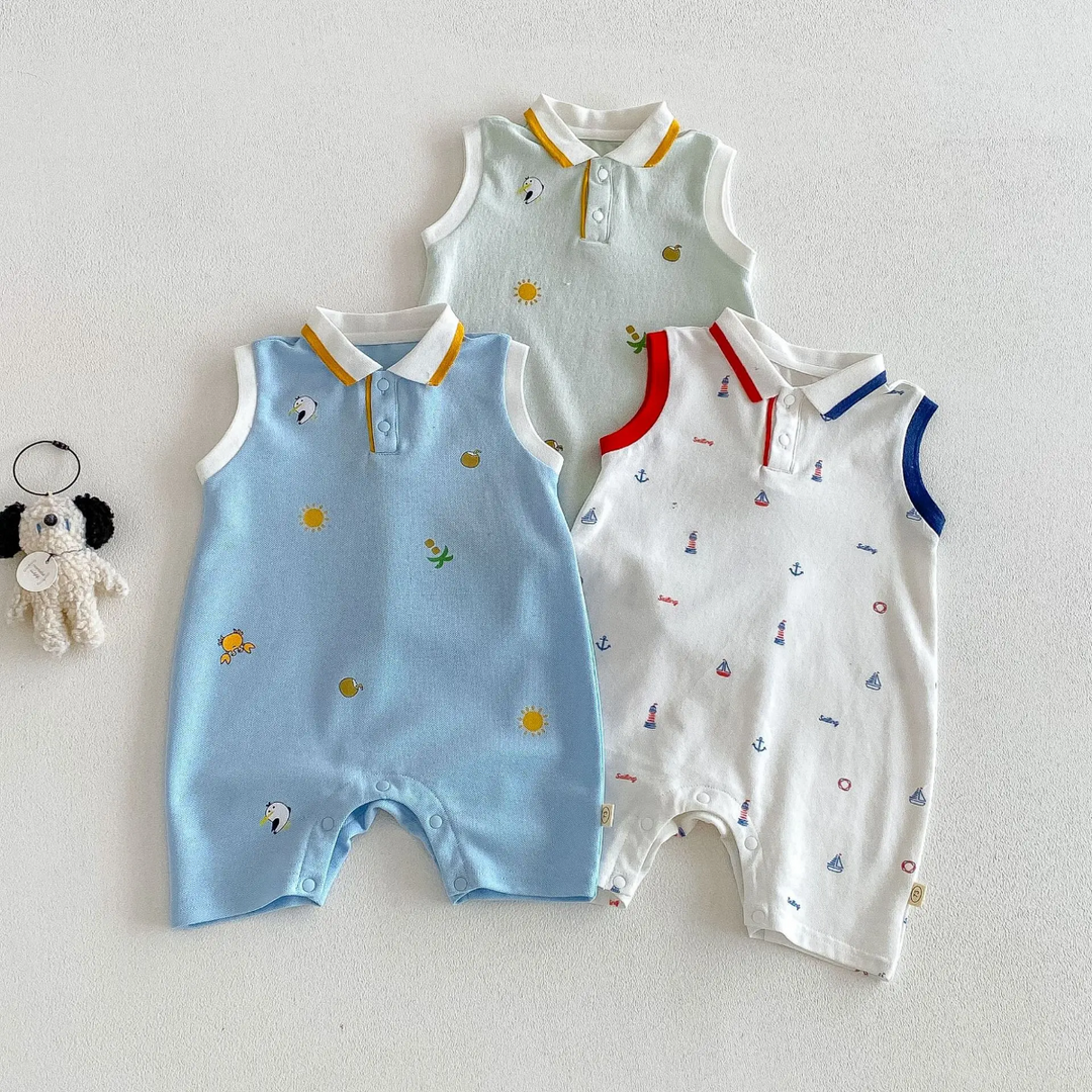 Light blue, white, and light green printed baby polo rompers arranged flat with collars and short legs visible