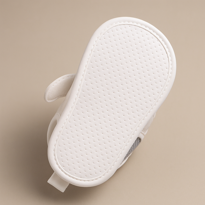 Close-up of the dotted outsole on a baby sandal