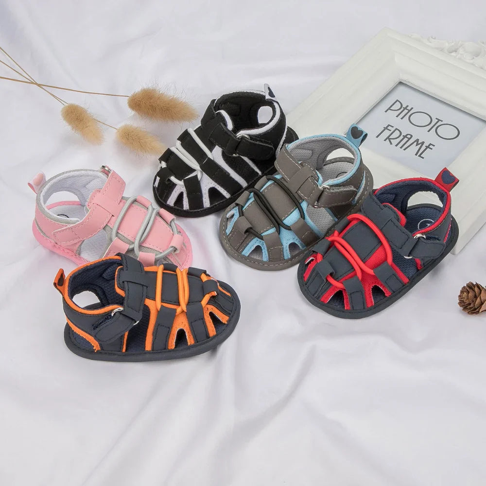 Baby sandals in five color combinations with ankle straps and openwork uppers