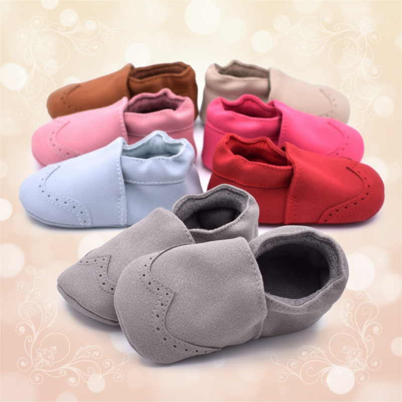 Baby shoes in assorted colors with gray brogue-style shoes at the front