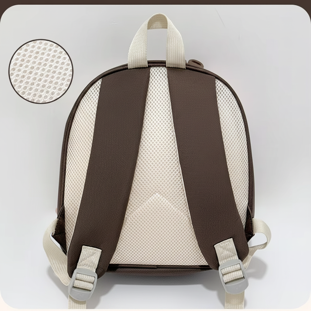 Rear view of the backpack with a mesh back panel and adjustable brown shoulder straps
