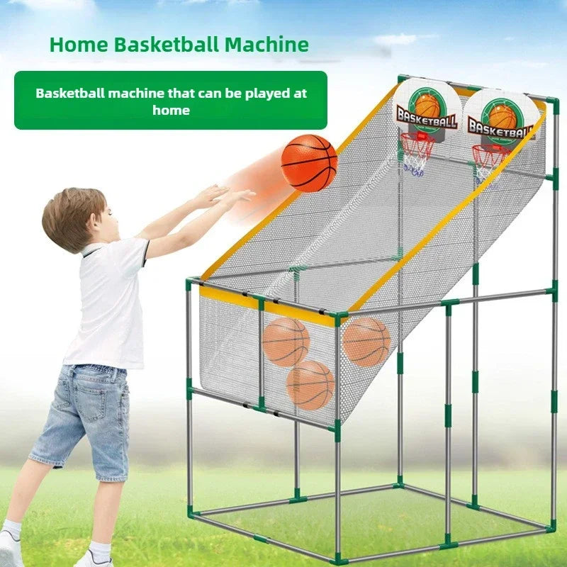 Child playing with an arcade-style basketball hoop and netted ramp outdoors