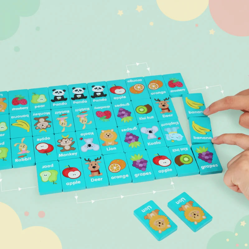 Hands matching banana tiles among colorful animal and fruit pictures