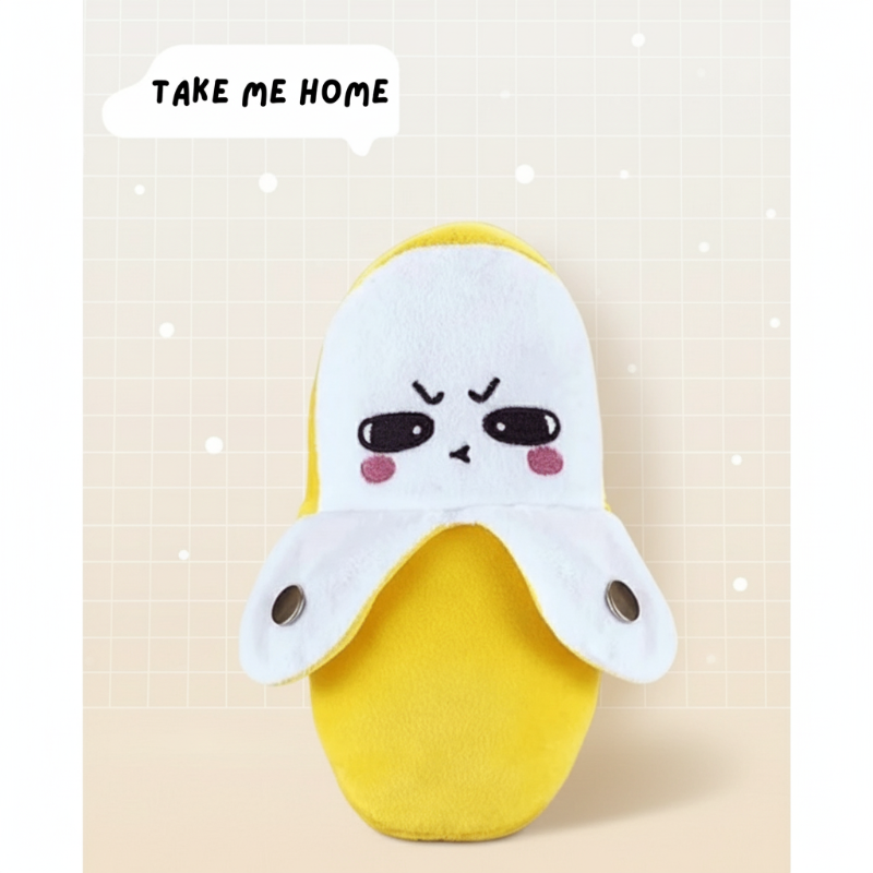 Front view of the yellow banana musical toy with white plush peel flaps