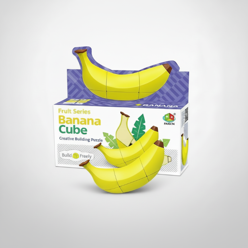 Yellow banana-shaped twist puzzle displayed in front of its retail box
