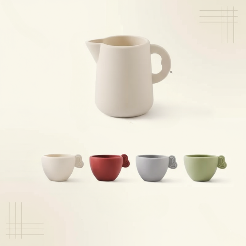 Basic tea set with a cream-colored pitcher and four cups in cream, red, gray, and green