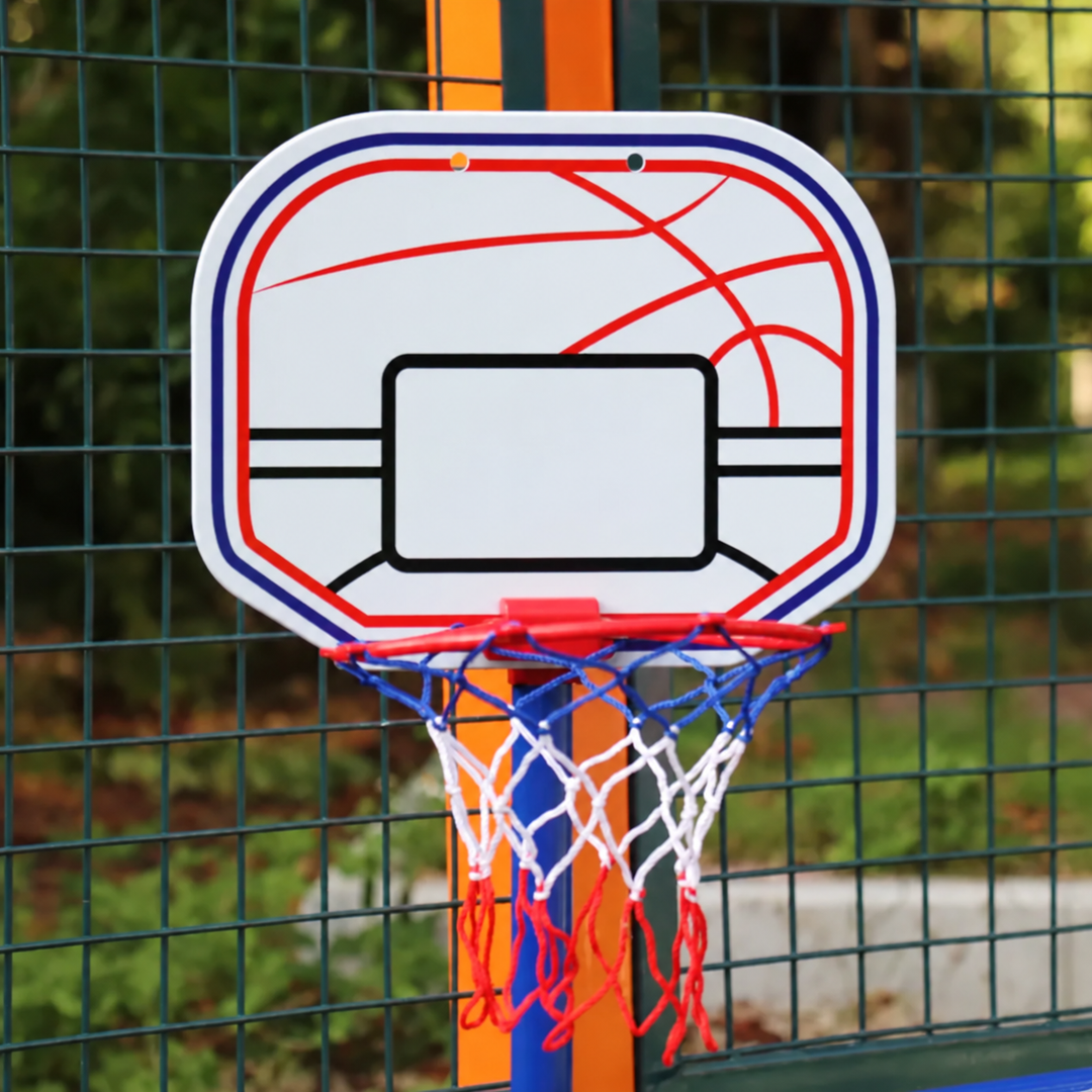 Close-up of a basketball backboard, red rim and red, white and blue net outdoors