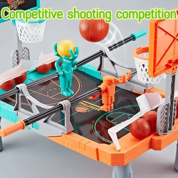 Close-up of orange and teal player figures holding balls near the tabletop basketball hoops
