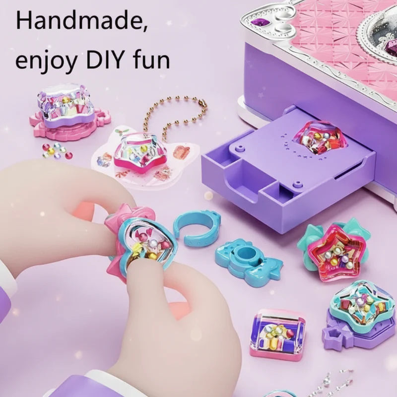 Hands fitting a bead-filled charm onto a ring beside the jewelry craft station.