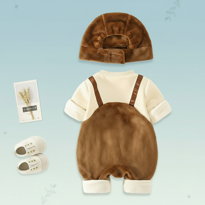 Back view of the brown plush baby romper with cream sleeves and coordinating hat