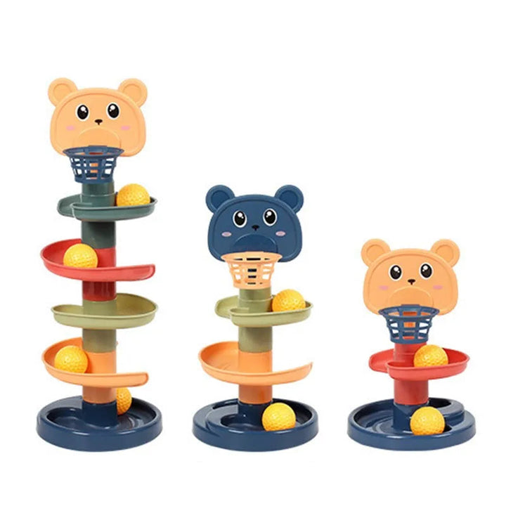 Three bear-topped ball-drop towers arranged in different heights and colors