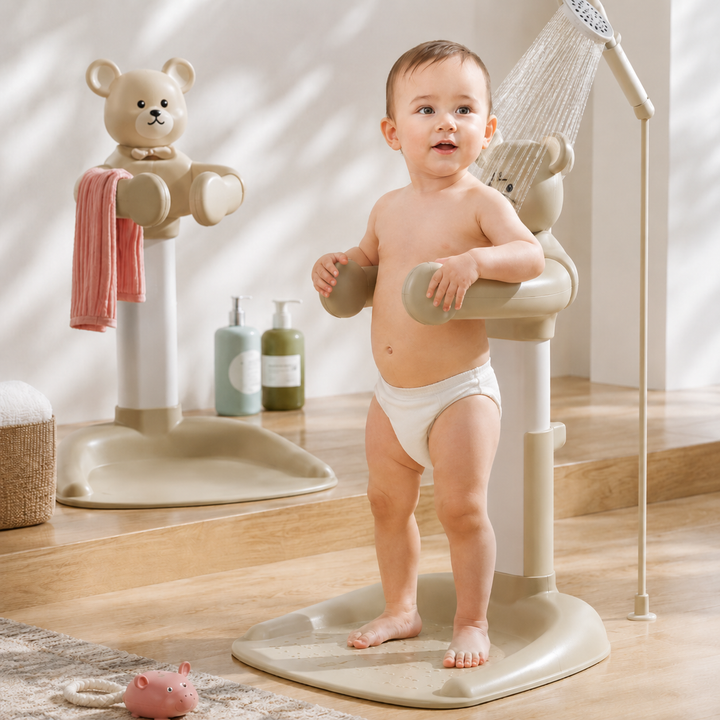Toddler standing on the bear-themed bath stand with an arm resting on the surrounding ring