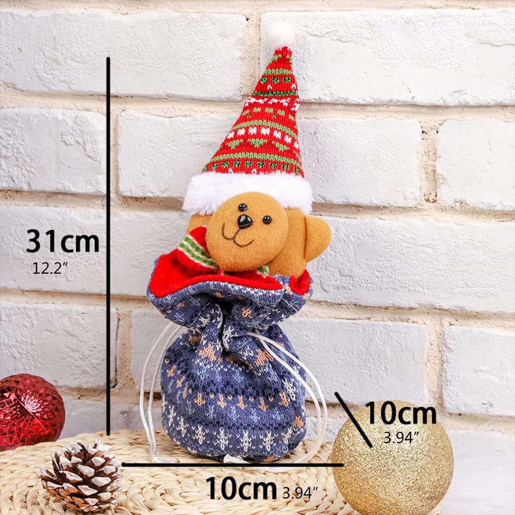 Blue snowflake-pattern bear gift bag with a red hat and measurements of 31 × 10 × 10 cm.