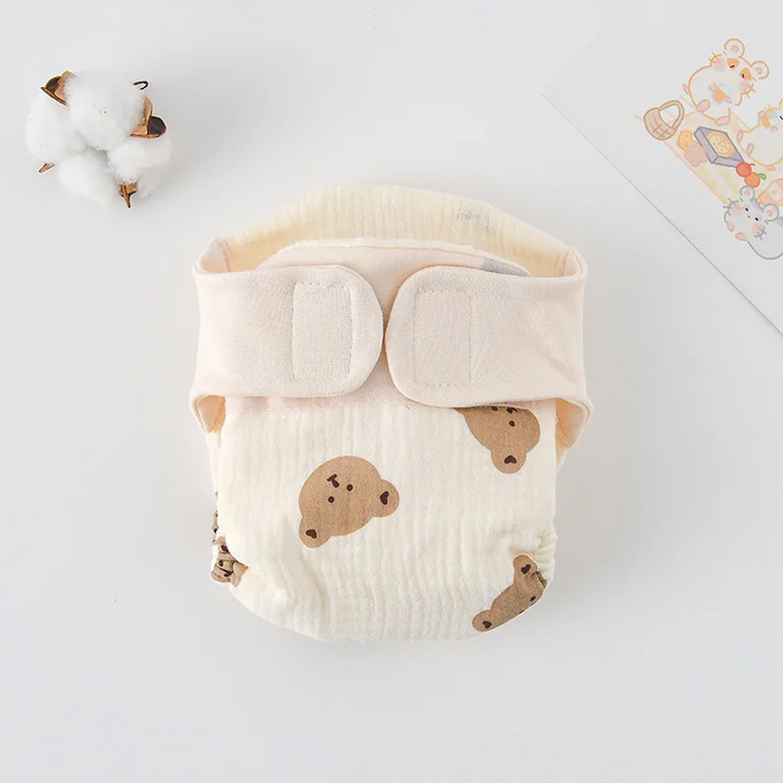 Bear-face print cloth diaper with a wide cream hook-and-loop waistband