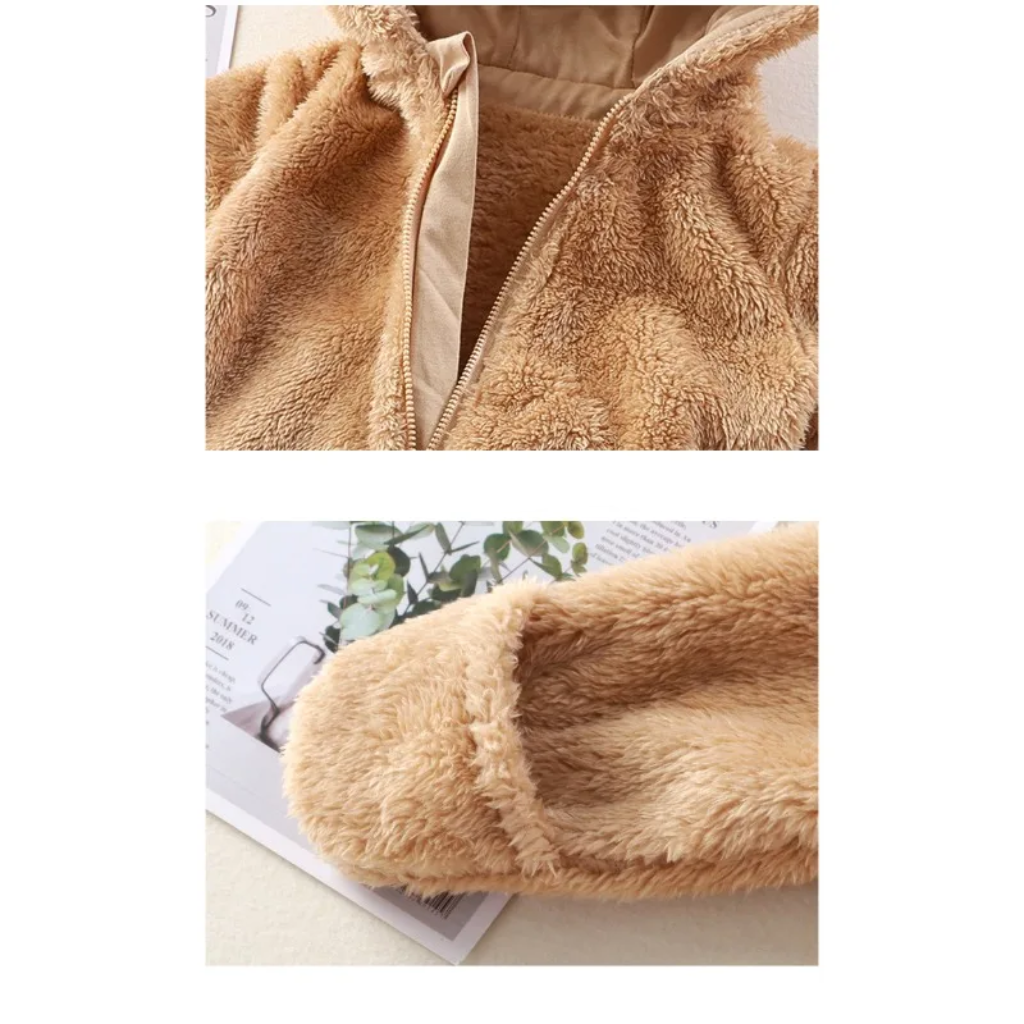 Close-ups of the brown bear onesie&