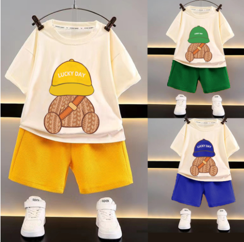 Cream teddy bear T-shirts with coordinating yellow, green, and blue shorts shown together
